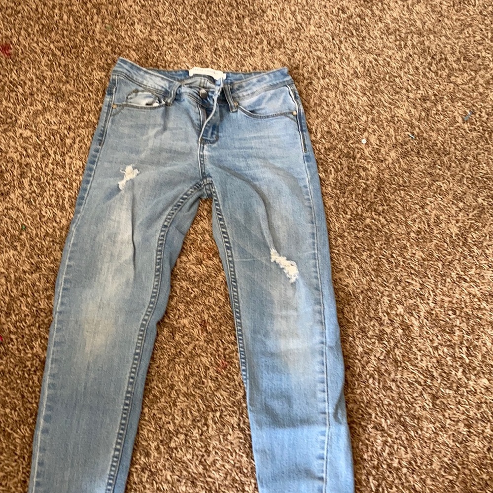 Ripped light washed jeans